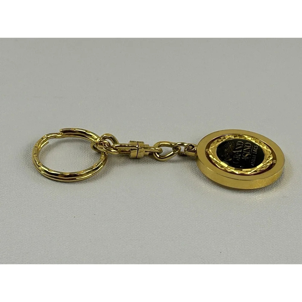 Vintage Grand Casino Mille Lacs Gold Tone Spinner Keychain Fob Souvenir